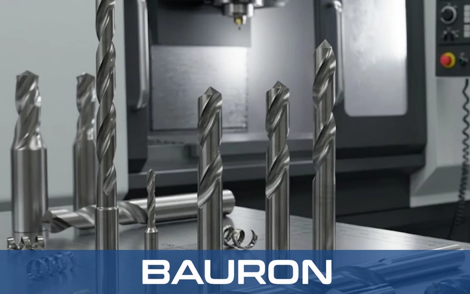 Step drills and twist drills standing inside a CNC machining center
