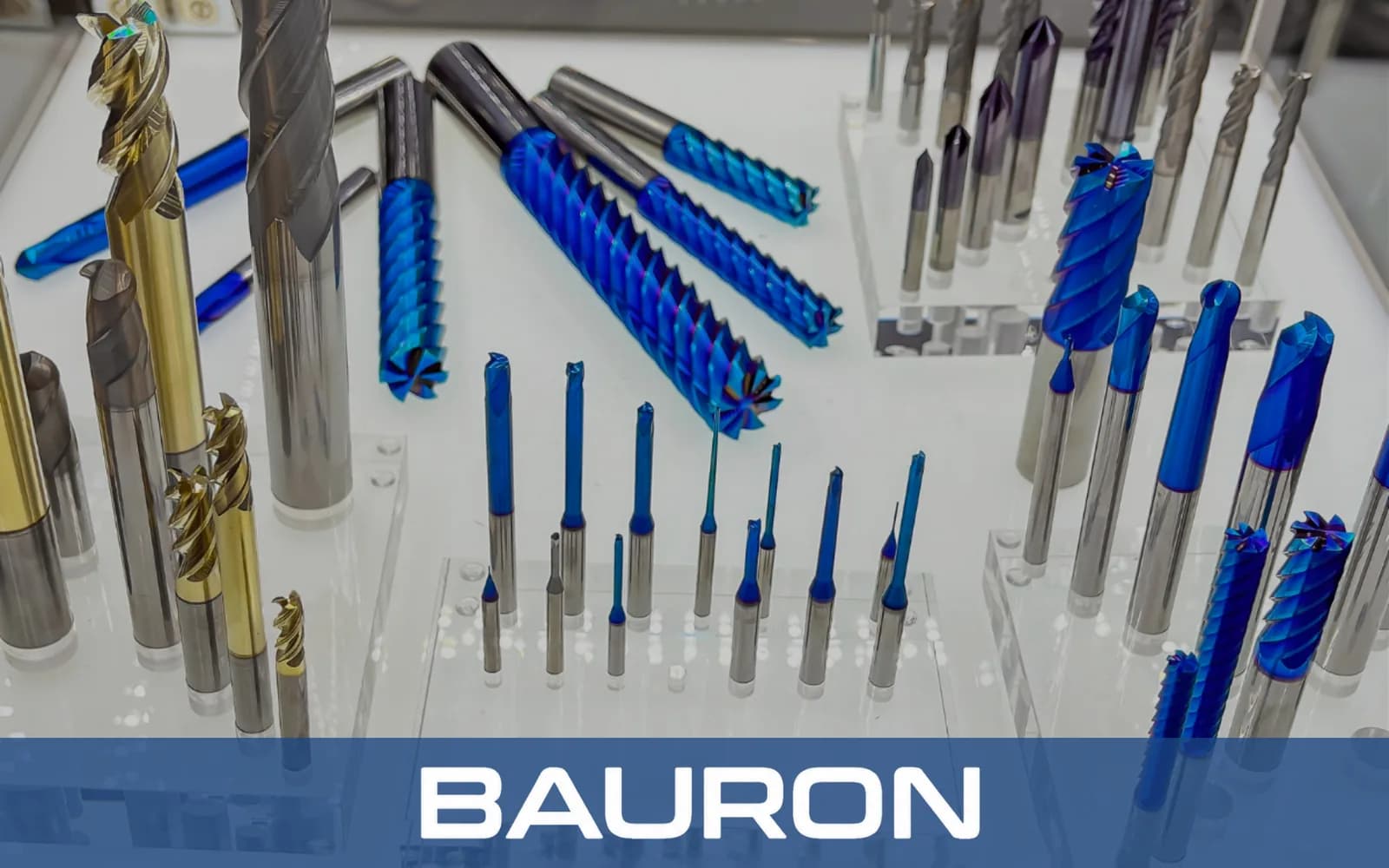 Assortment of coated end mills, ball nose and micro cutters on display stands