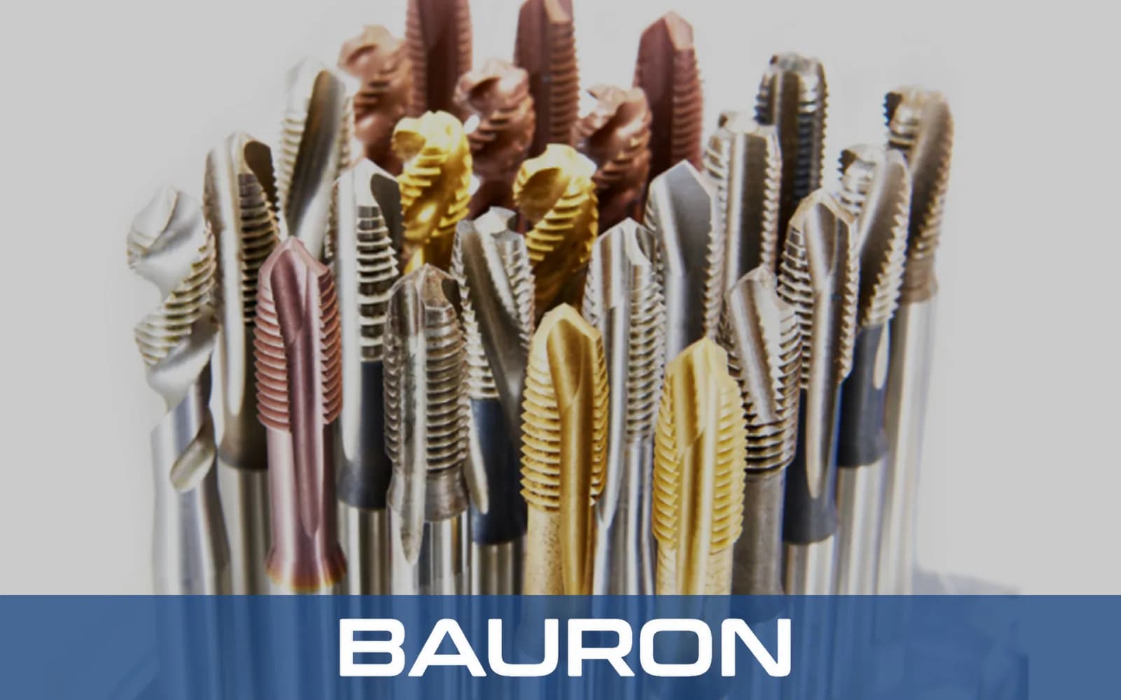 Bundle of coated machine taps with different flute styles